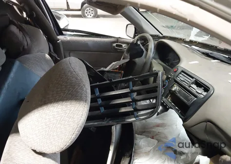 2000 Honda Civic Lx z USA, uszkodzony, nr VIN 1HGEJ667XYL038812